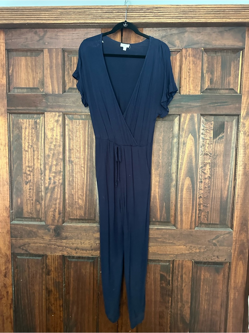 Charming Charlie Navy Wrap Jumpsuit with Tie Waist
